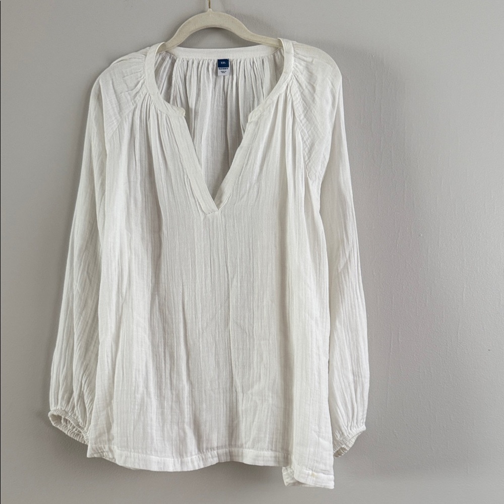 White blouse made of slightly creased material, size XXL